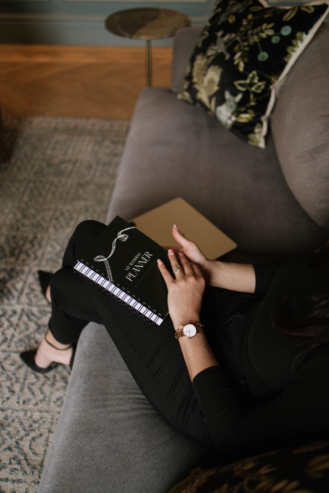 Henrike holding a wedding planner notebook